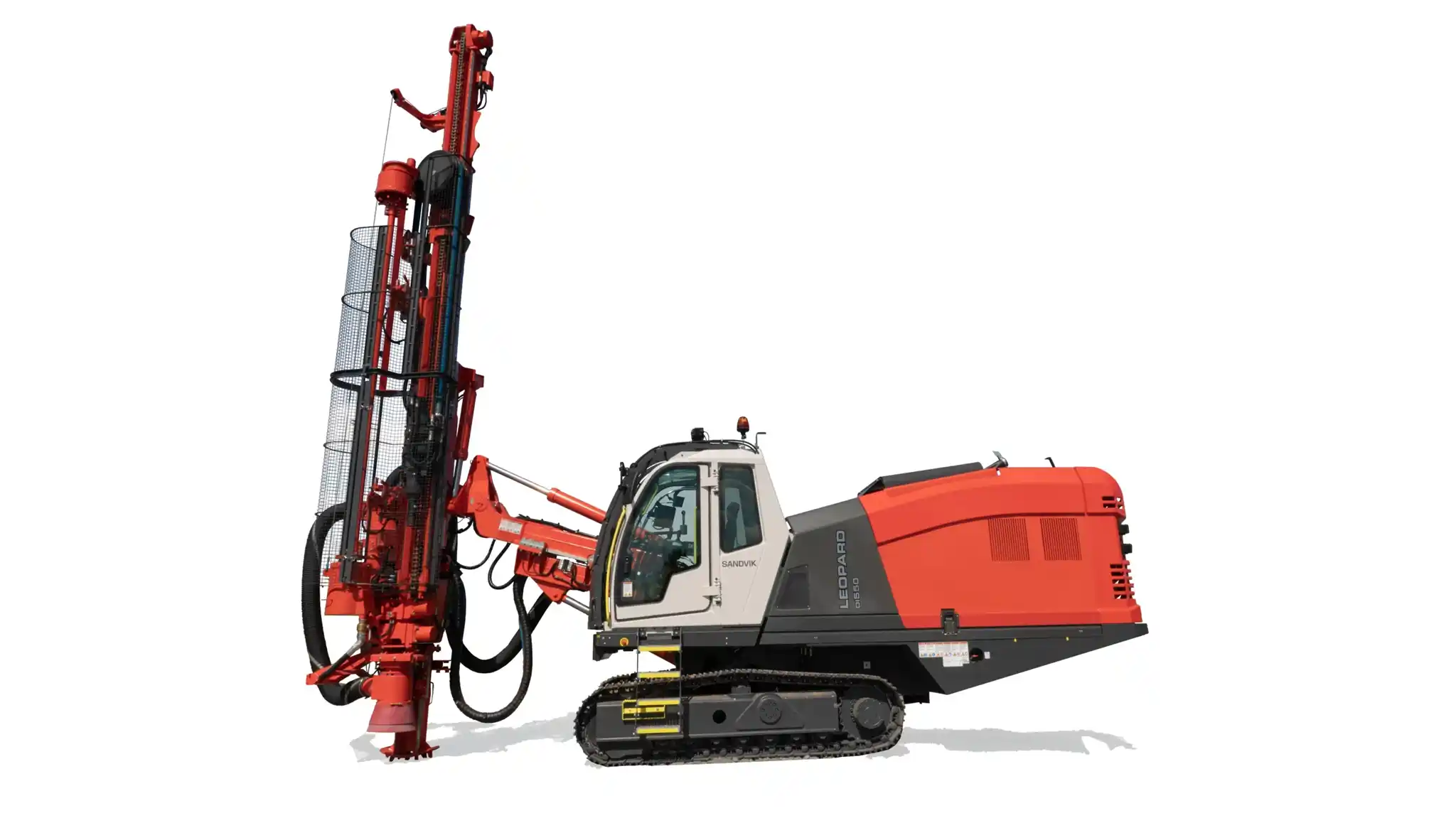 Sandvik Ranger DX surface top hammer drill rig shown in a mining or construction environment from a front-side angle. The yellow, self-propelled machine features a reinforced operator cabin, articulated drilling boom, and large rugged tires designed for precise and efficient surface drilling in quarrying and mining applications.