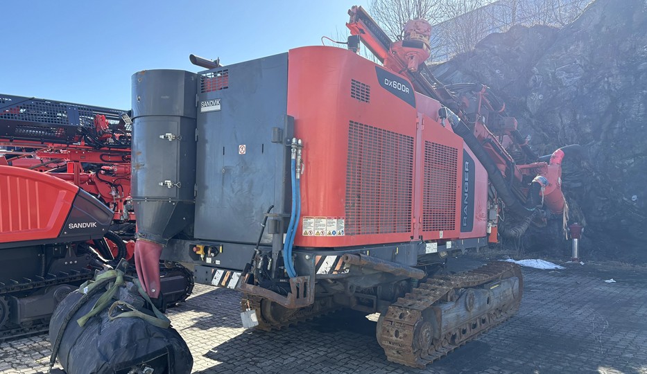 Sandvik Ranger™ DX600R surface drill rig operating on site, heavy-duty drilling equipment for mining and quarrying applications.