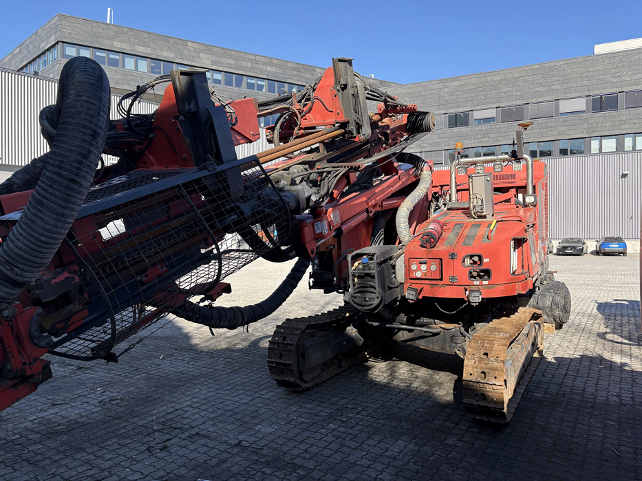 Sandvik Ranger™ DX600R surface drill rig operating on site, heavy-duty drilling equipment for mining and quarrying applications.