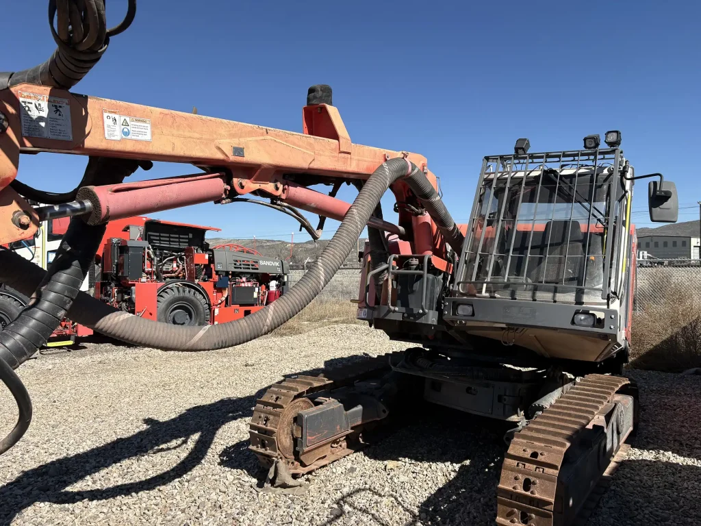 Sandvik Ranger™ DX800 surface drill rig operating on site, heavy-duty drilling equipment for mining and quarrying applications.