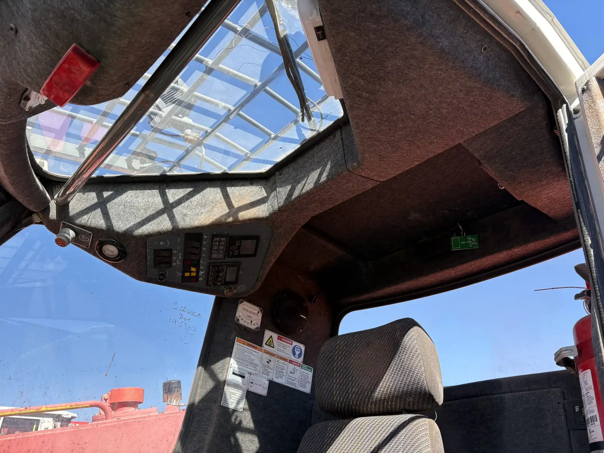 Sandvik Ranger™ DX800 surface drill rig operating on site, heavy-duty drilling equipment for mining and quarrying applications.