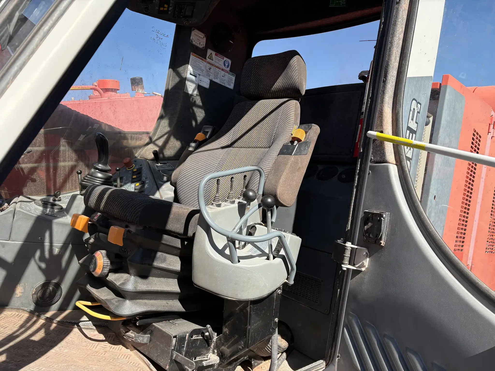 Sandvik Ranger™ DX800 surface drill rig operating on site, heavy-duty drilling equipment for mining and quarrying applications.