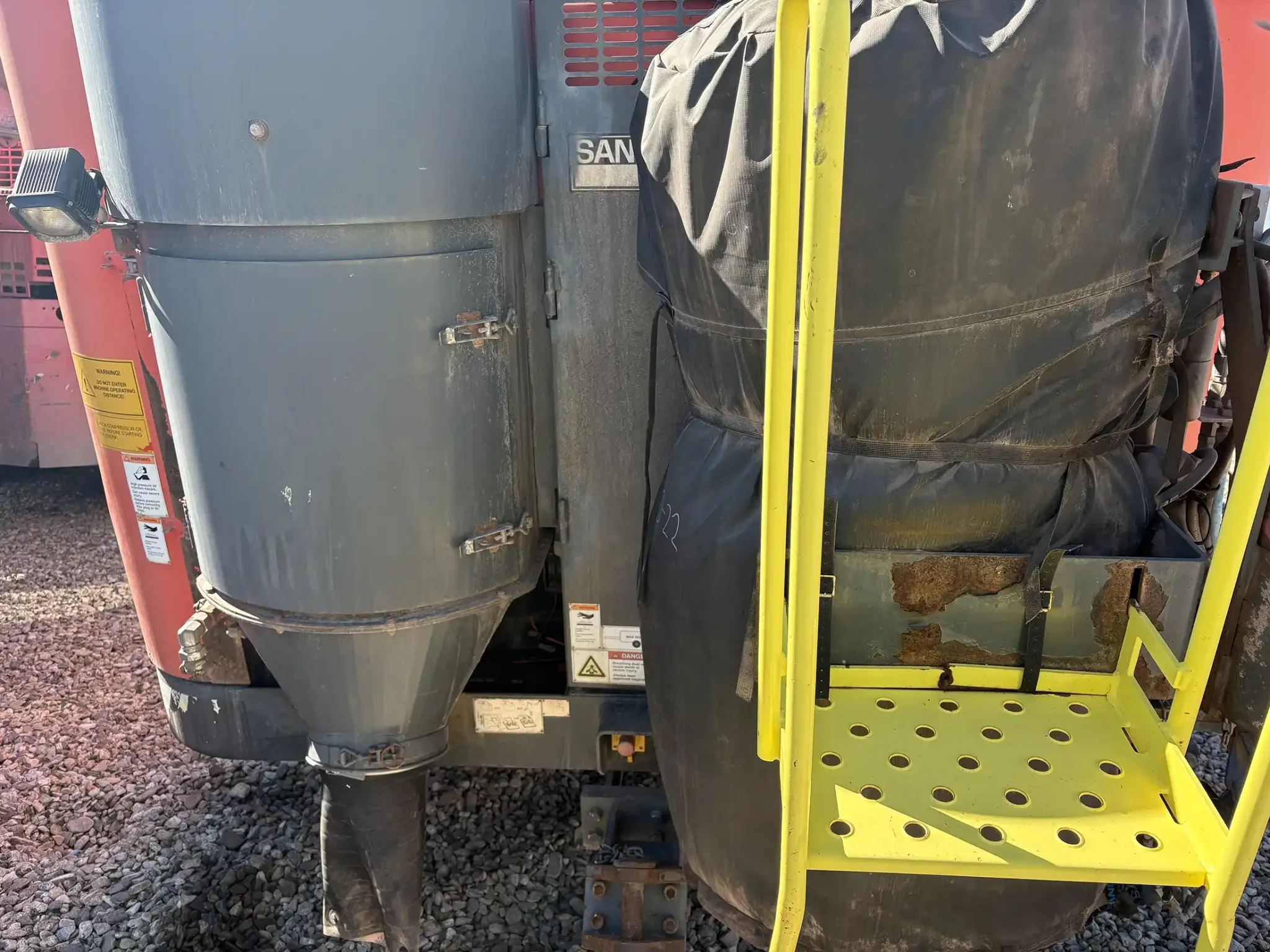 Sandvik Ranger™ DX800 surface drill rig operating on site, heavy-duty drilling equipment for mining and quarrying applications.