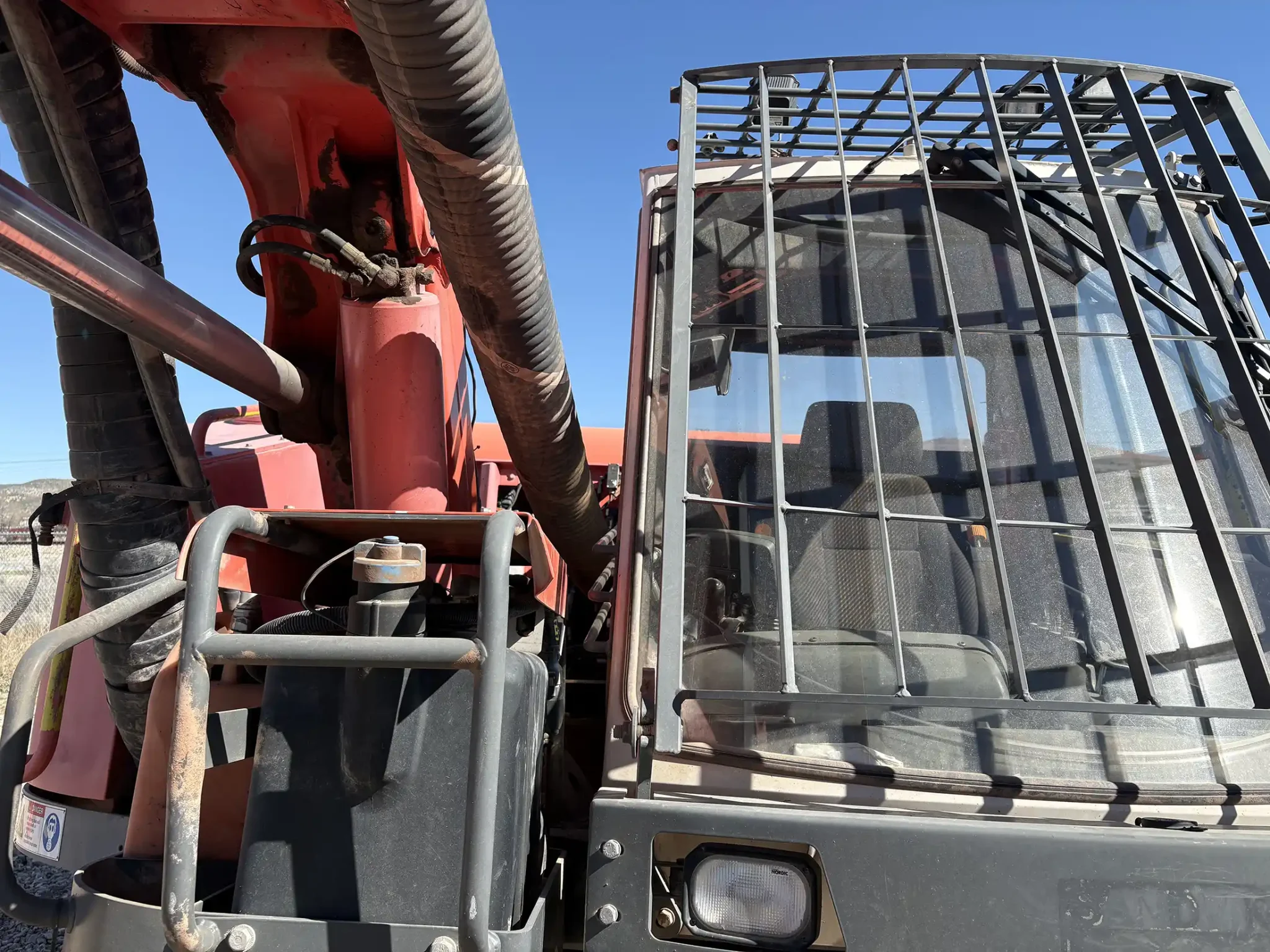 Sandvik Ranger™ DX800 surface drill rig operating on site, heavy-duty drilling equipment for mining and quarrying applications.